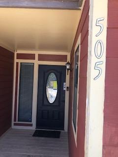 505 Demarett Drive, Unit 12 Point Venture, TX 78645 - Photo 4 of 15 a view of front door with wooden floor