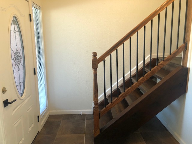 505 Demarett Drive, Unit 12 Point Venture, TX 78645 - Photo 5 of 15 a view of stairs with wooden floor and stairs
