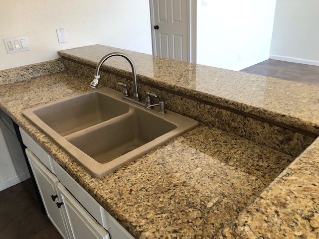 505 Demarett Drive, Unit 12 Point Venture, TX 78645 - Photo 8 of 15 a close view of sink and tap