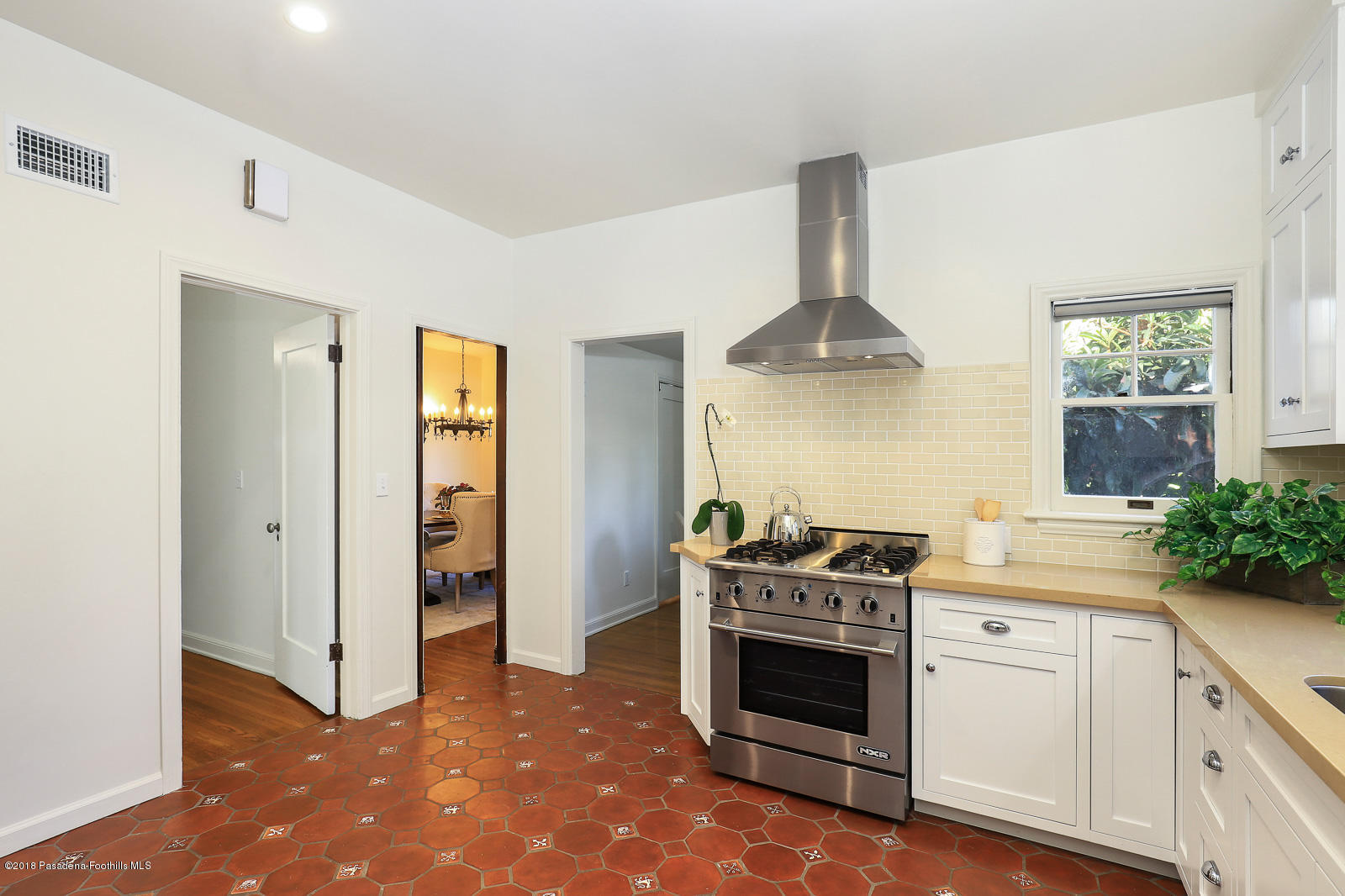 884 Old Mill Road Pasadena, CA 91108 - Photo 19 of 32 a kitchen with a stove and a refrigerator