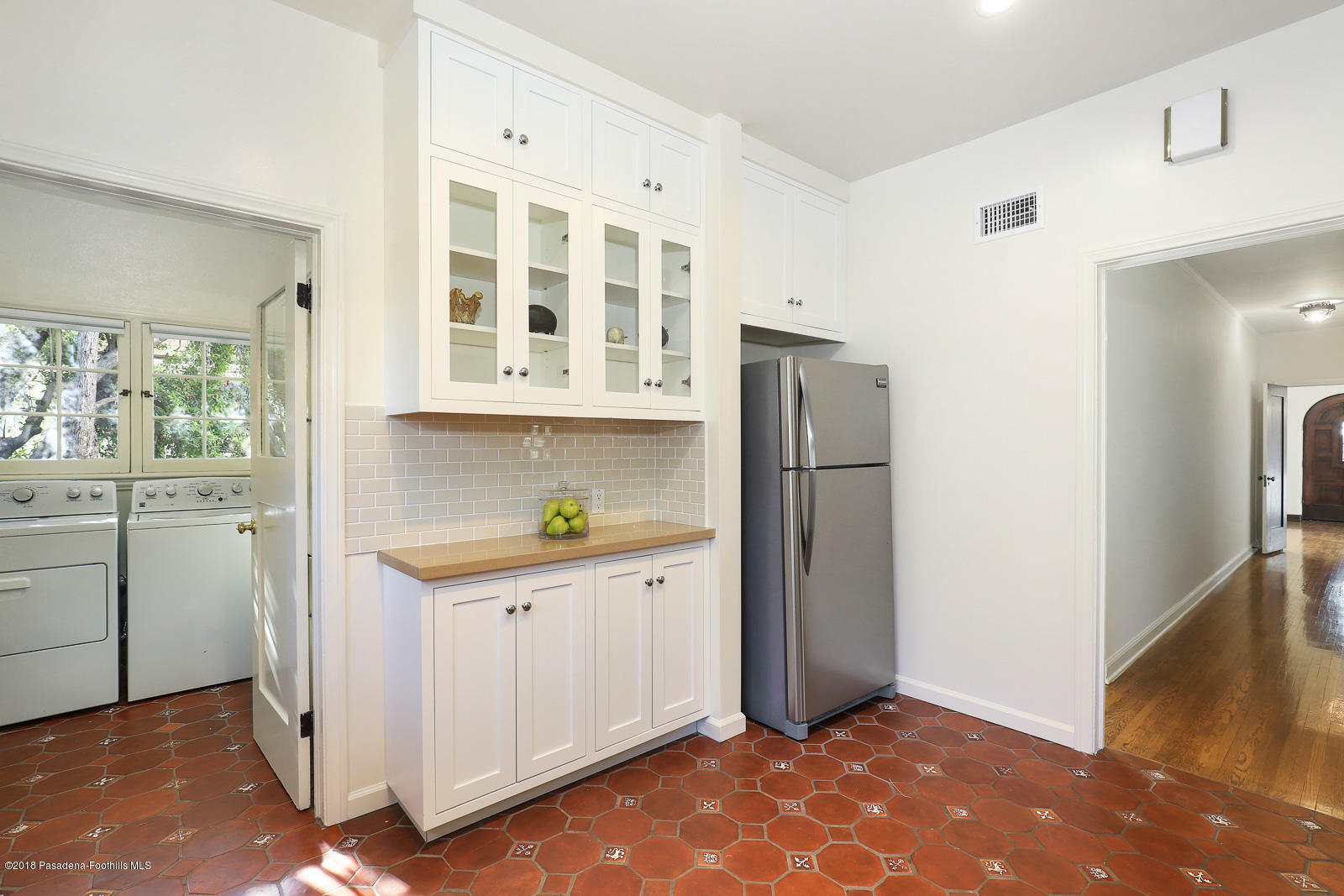 884 Old Mill Road Pasadena, CA 91108 - Photo 20 of 32 a kitchen with stainless steel appliances granite countertop a refrigerator and a stove