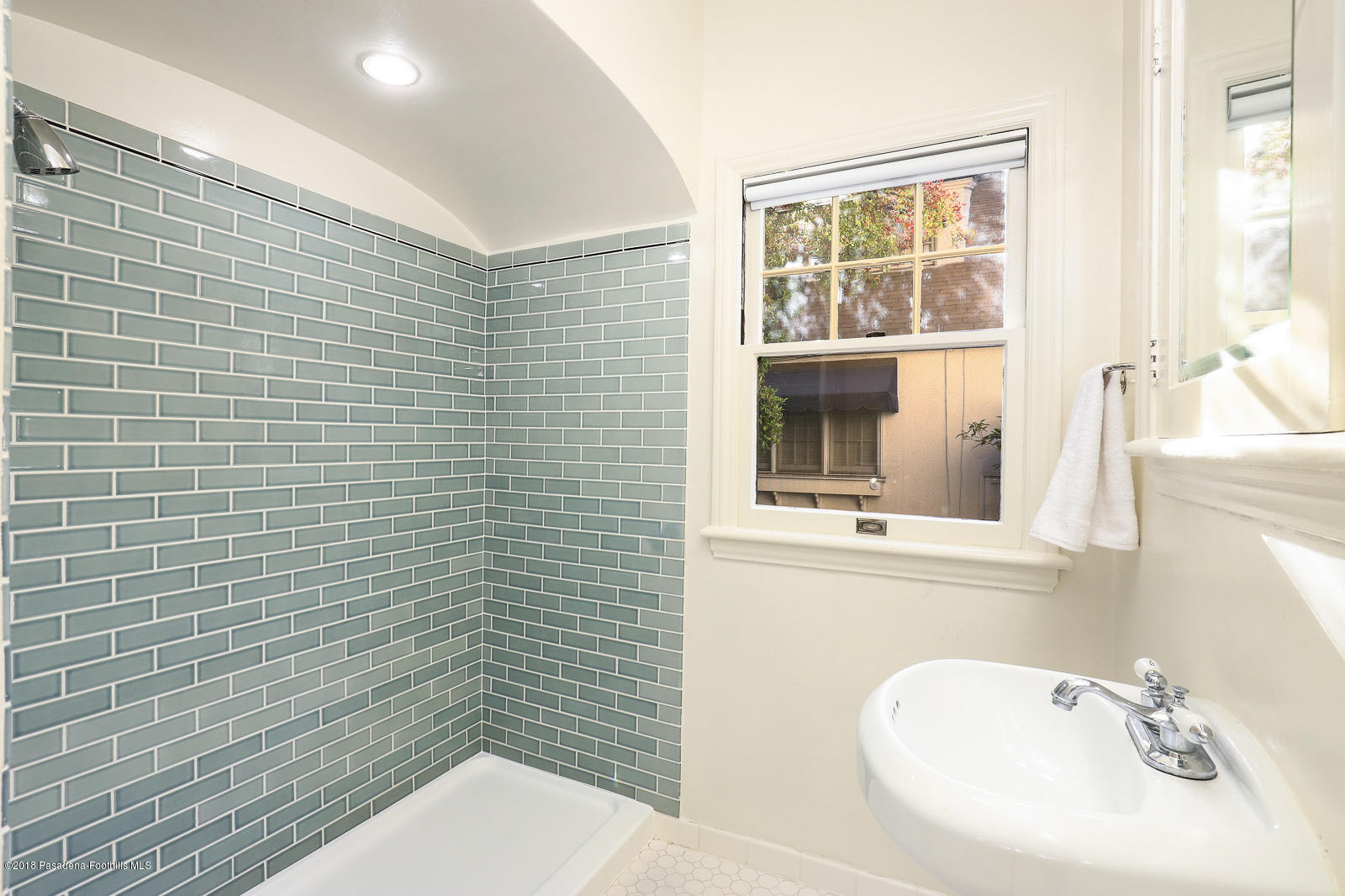 884 Old Mill Road Pasadena, CA 91108 - Photo 22 of 32 a bathroom with a sink a toilet and shower