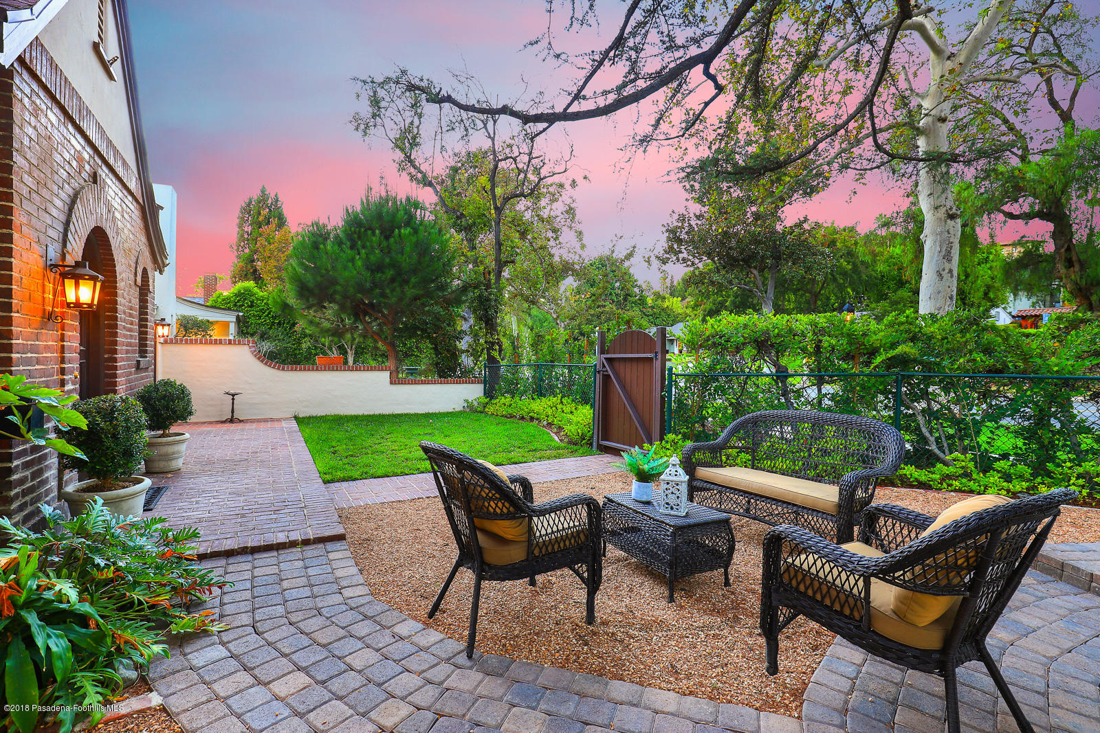 884 Old Mill Road Pasadena, CA 91108 - Photo 8 of 32 a view of a chairs and table in backyard of the house
