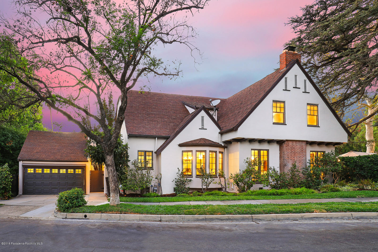 884 Old Mill Road Pasadena, CA 91108 - Photo 9 of 32 a front view of a house with a yard