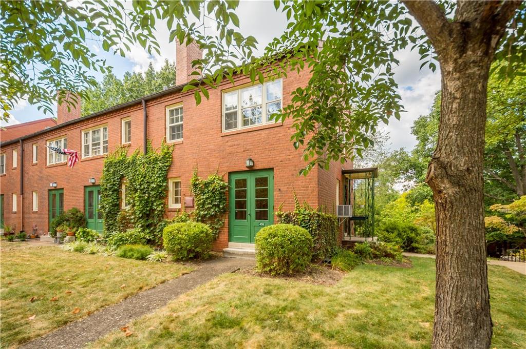 426 Sulgrave Road Pittsburgh, PA 15211 - Photo 10 of 39 a view of a house with a tree in front of it