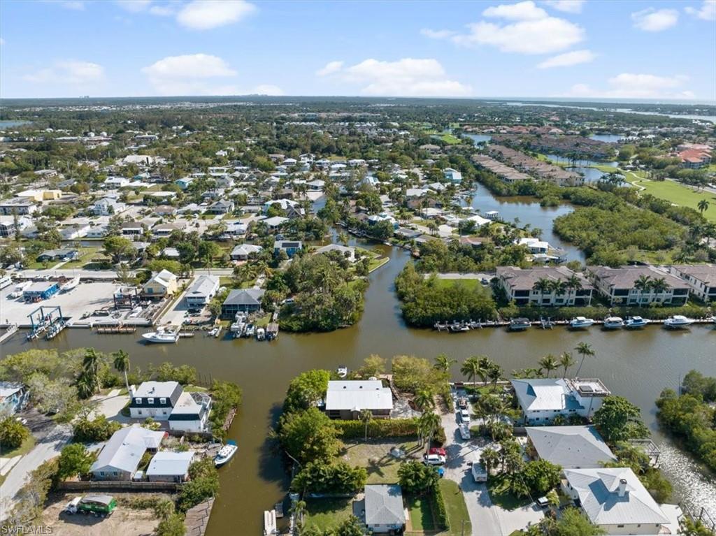 2997 Poplar Street Naples, FL 34112 - Photo 45 of 49 an aerial view of a city with lake view