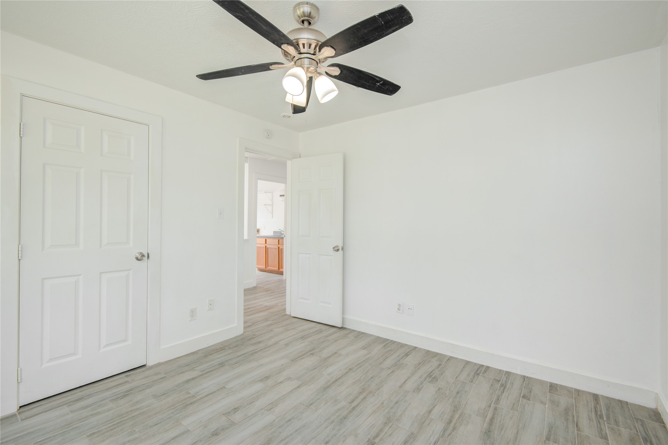10023 Farrell Drive Houston, TX 77070 - Photo 19 of 26 wooden floor in an empty room