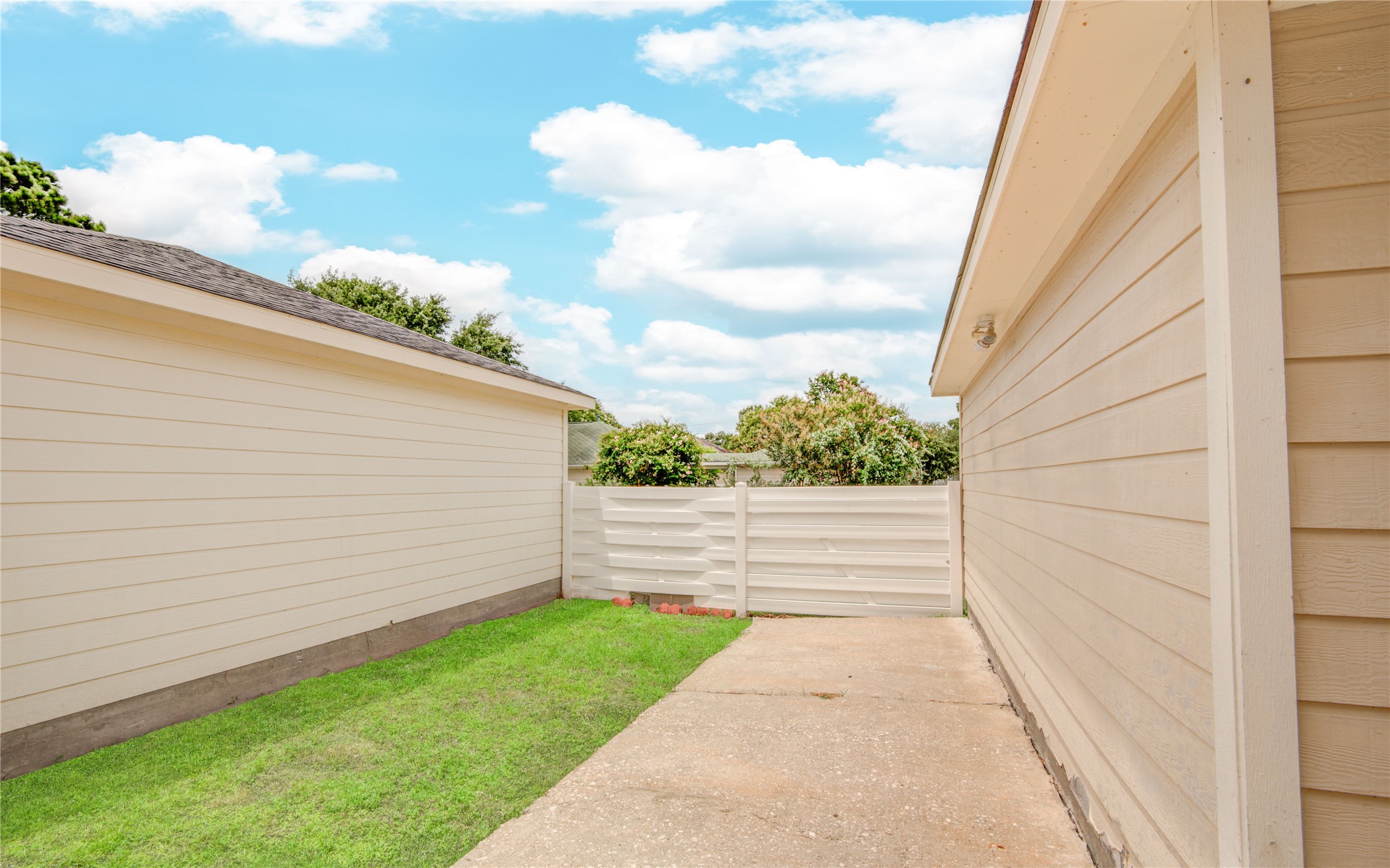 10023 Farrell Drive Houston, TX 77070 - Photo 25 of 26 a view of a backyard with wooden fence