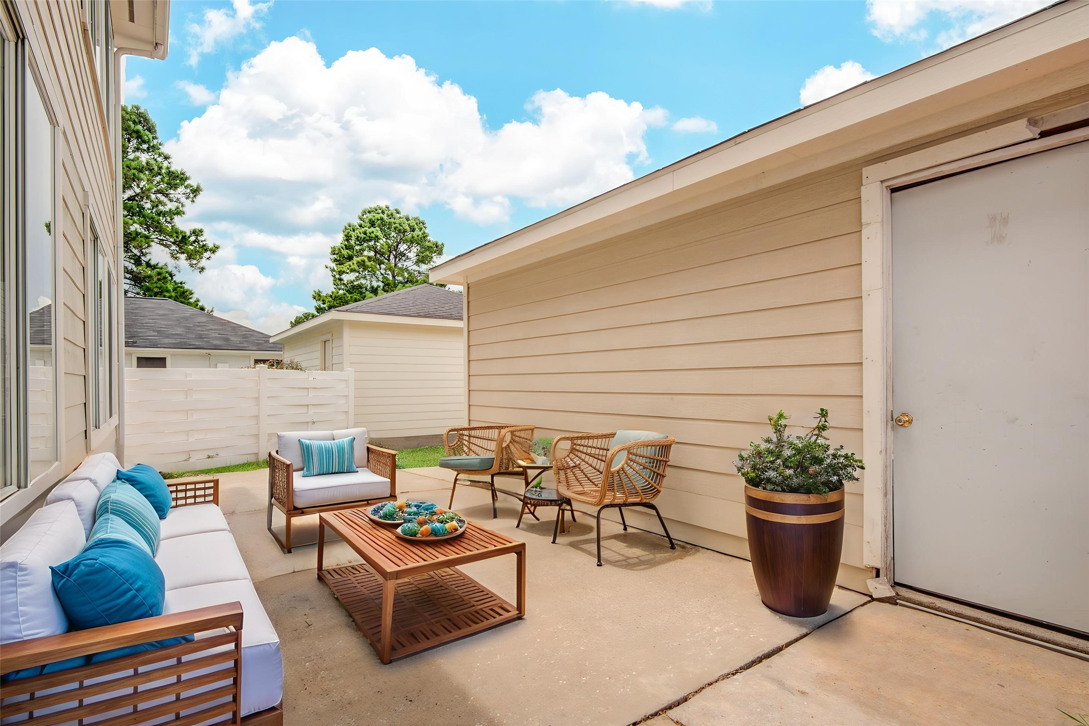 10023 Farrell Drive Houston, TX 77070 - Photo 26 of 26 a backyard of a house with barbeque oven table and chairs