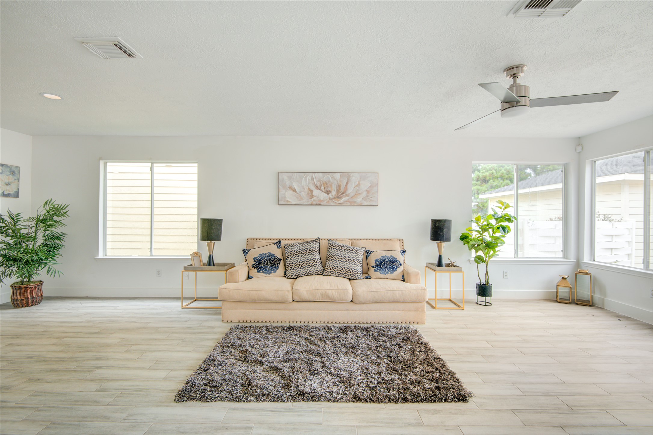 10023 Farrell Drive Houston, TX 77070 - Photo 5 of 26 a living room with furniture and a large window