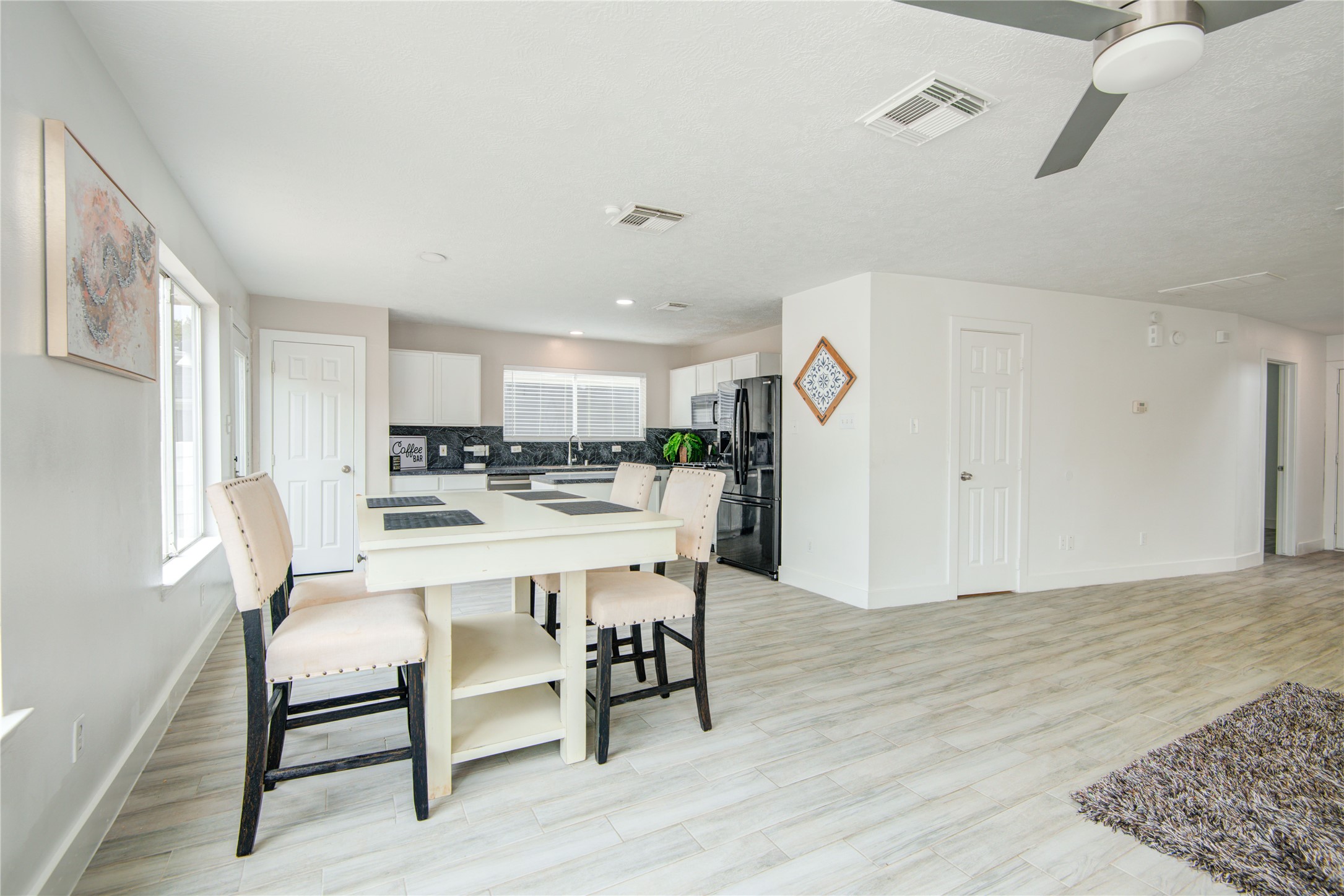 10023 Farrell Drive Houston, TX 77070 - Photo 7 of 26 a dining room with furniture and window