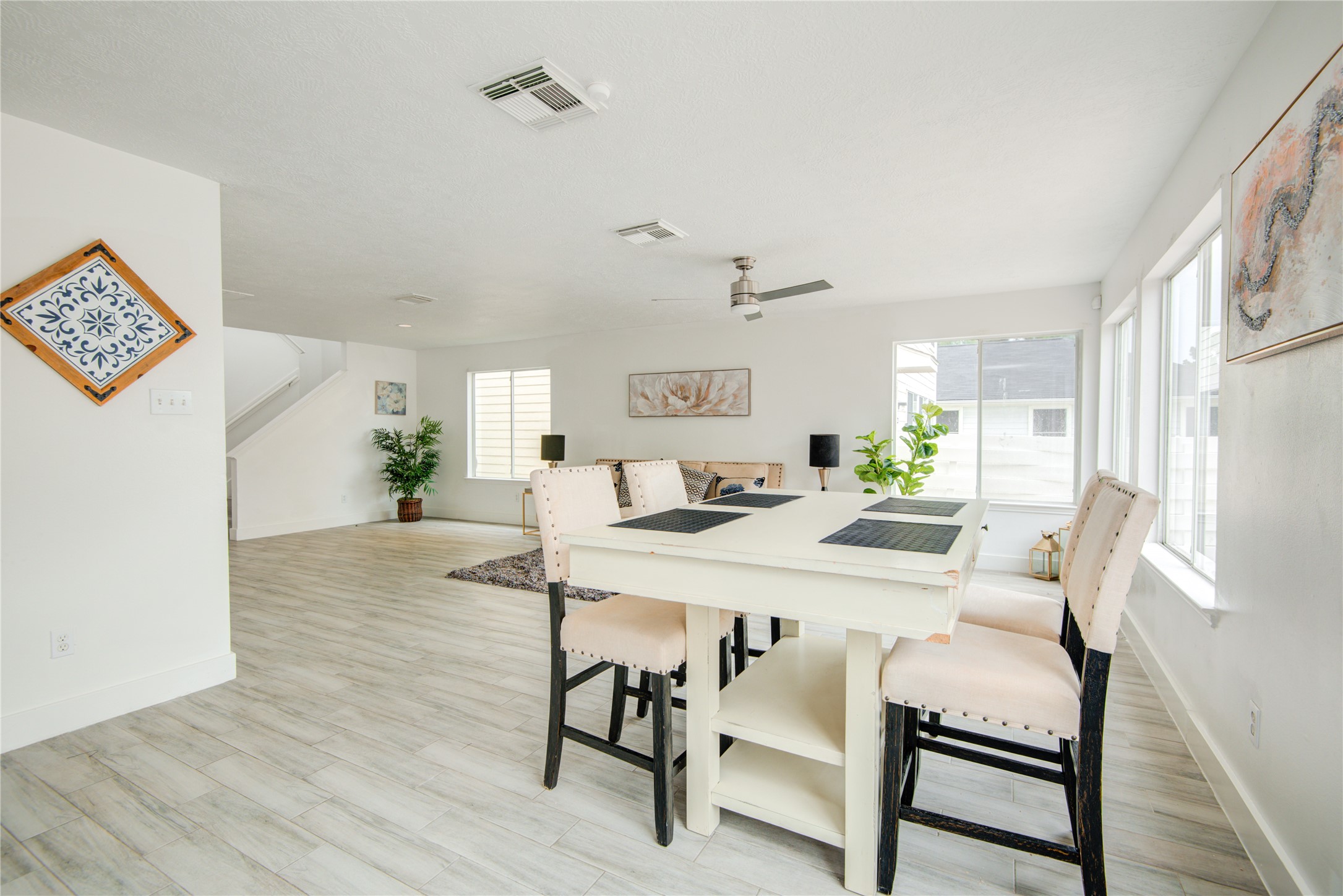 10023 Farrell Drive Houston, TX 77070 - Photo 9 of 26 a view of a dining room with furniture and wooden floor