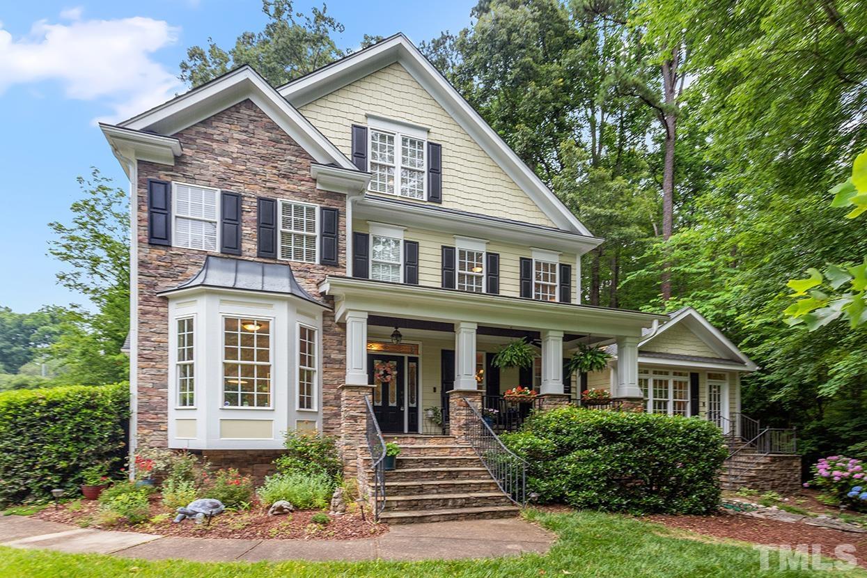 3102 Ringland Road Raleigh, NC 27613 - Photo 1 of 42 a front view of a house with garden