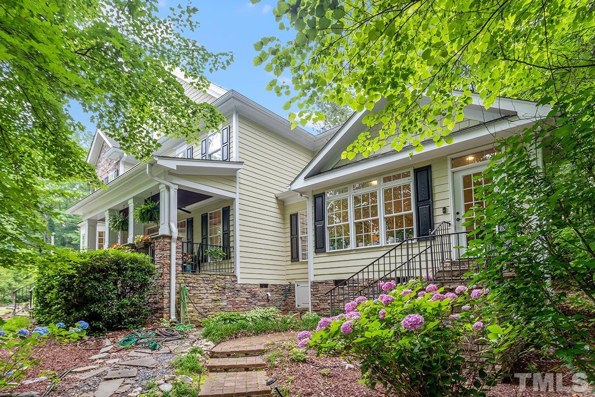 3102 Ringland Road Raleigh, NC 27613 - Photo 2 of 42 a house that has a lot of flowers in it