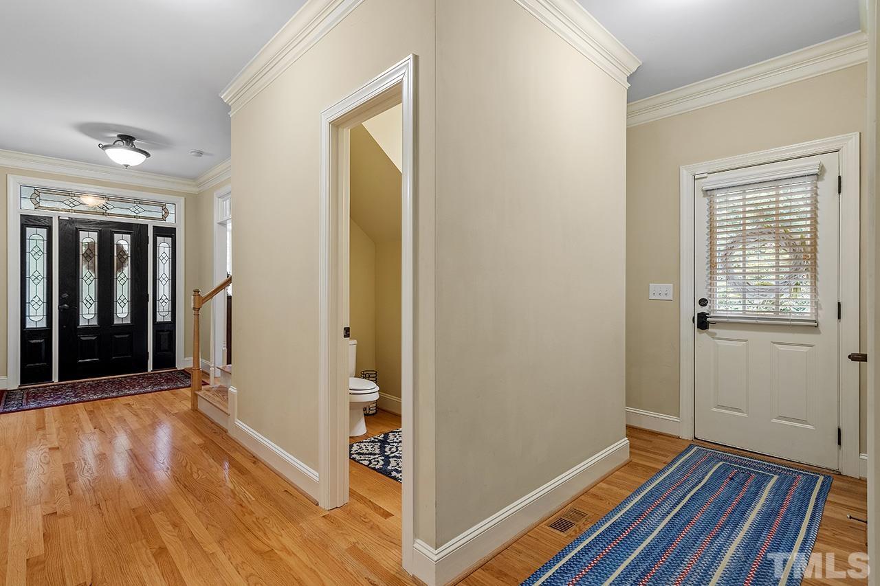 3102 Ringland Road Raleigh, NC 27613 - Photo 23 of 42 a view of a room with wooden floor and a window
