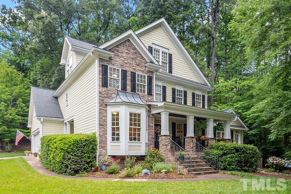 3102 Ringland Road Raleigh, NC 27613 - Photo 3 of 42 a front view of a house with a yard