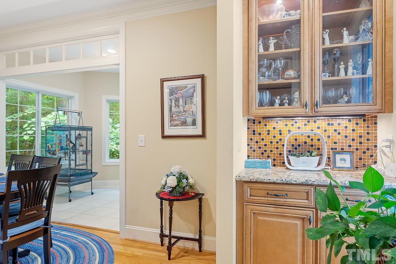 3102 Ringland Road Raleigh, NC 27613 - Photo 10 of 42 a view of a workspace with furniture