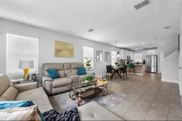 a living room with furniture and a table