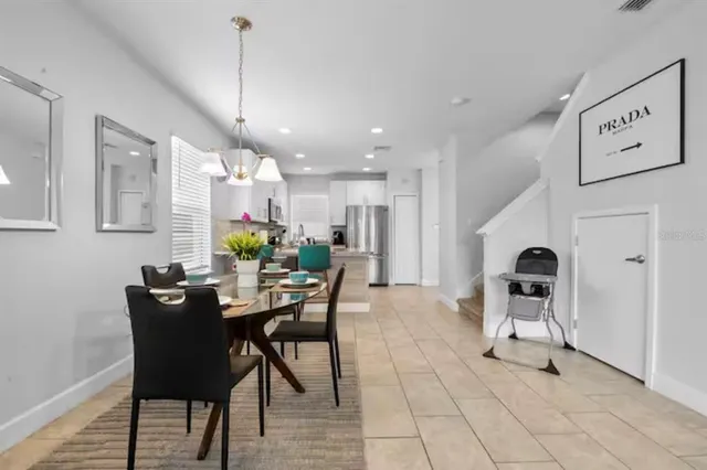 a view of a dining room with furniture