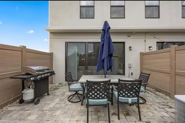 a view of a dinning room with furniture