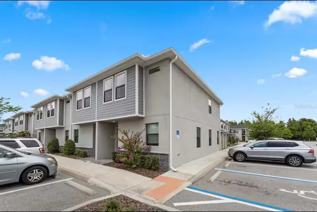 a car parked in front of a house