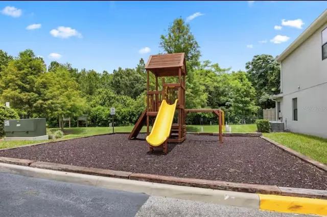 a view of a hallway with white walls