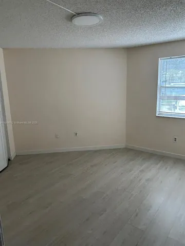 an empty room with a workbench