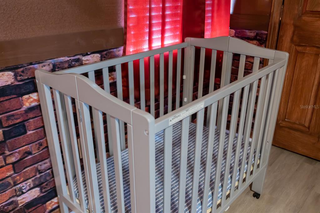 891 Assembly Court Reunion, FL 34747 - Photo 53 of 54 a view of staircase with railing and white walls