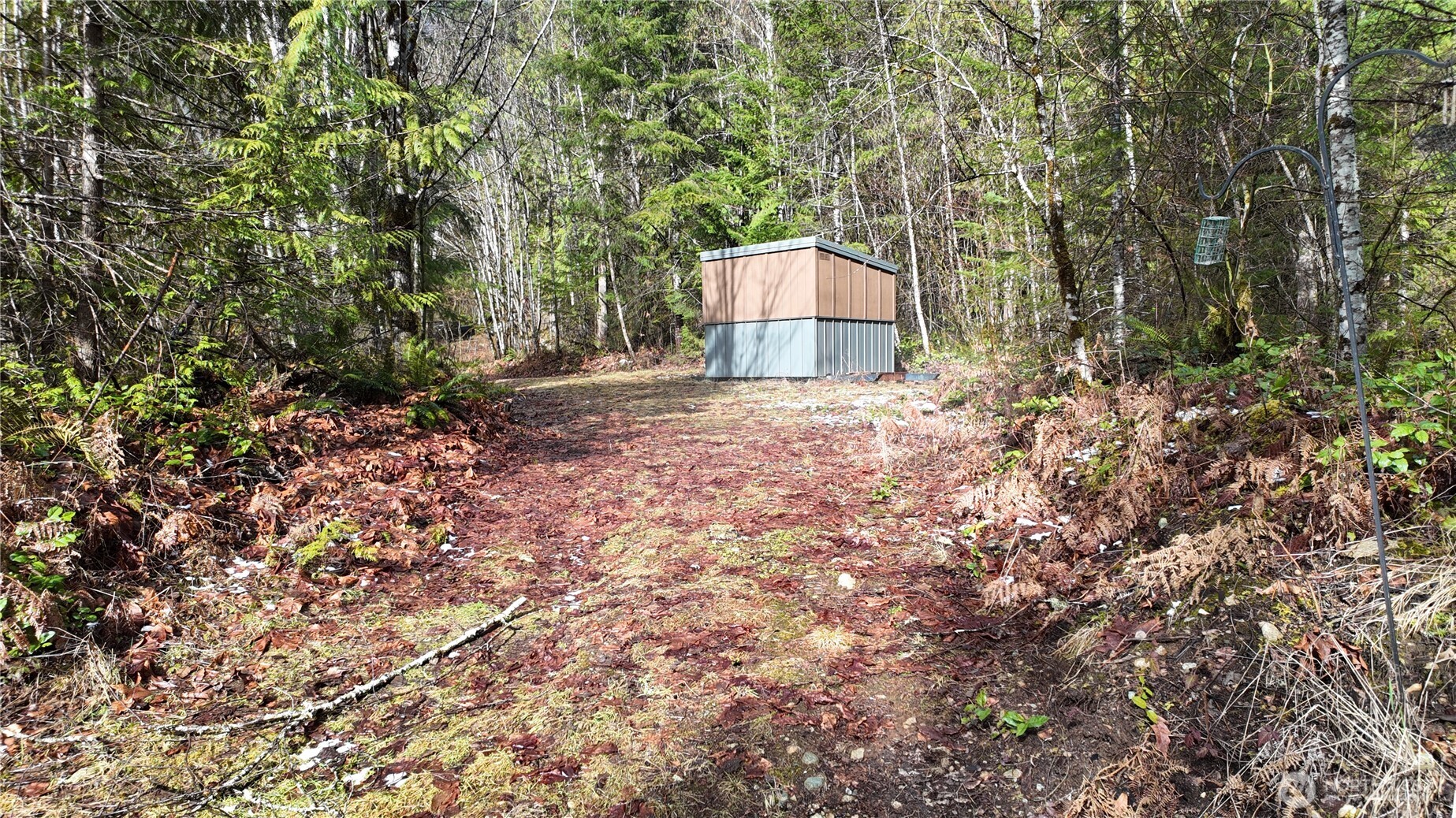 64084 Cascade River Road, Unit D1204 Marblemount, WA 98267 - Photo 13 of 26 a big house with lots of trees