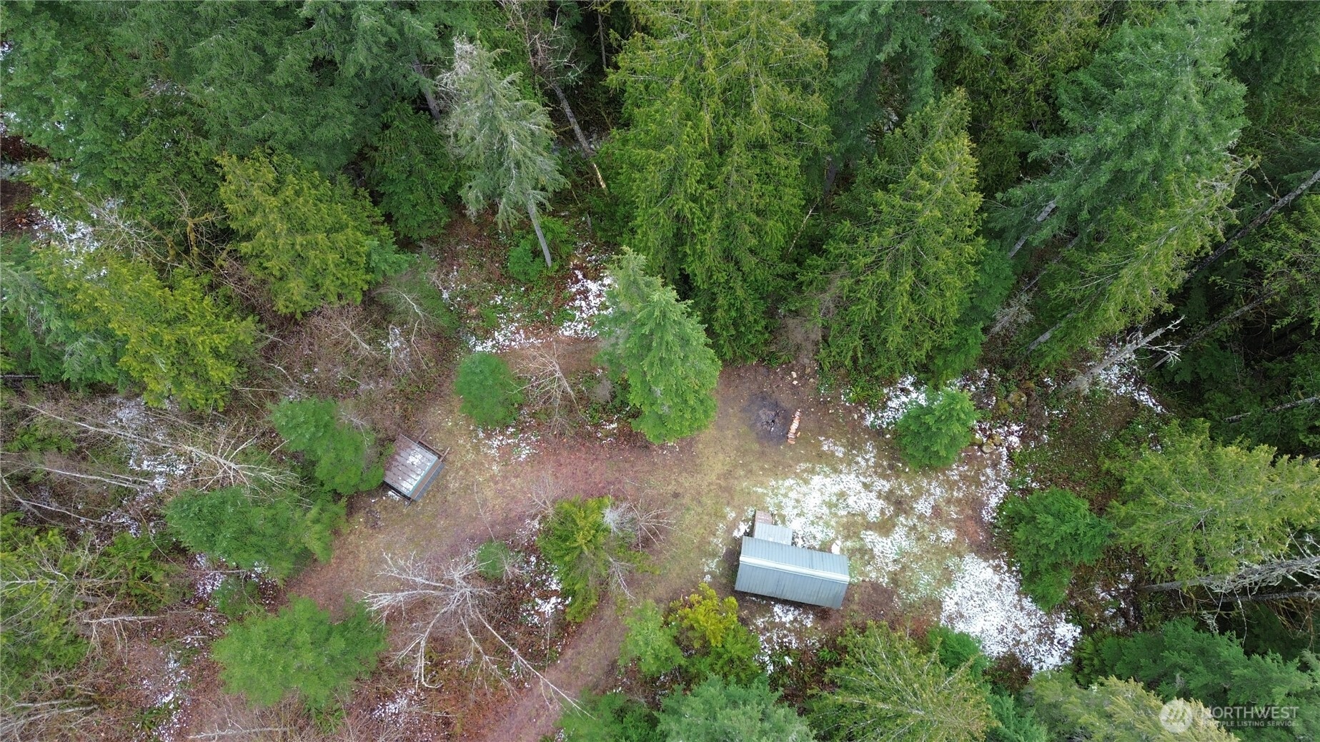 64084 Cascade River Road, Unit D1204 Marblemount, WA 98267 - Photo 19 of 26 an aerial view of a house with a yard and large trees
