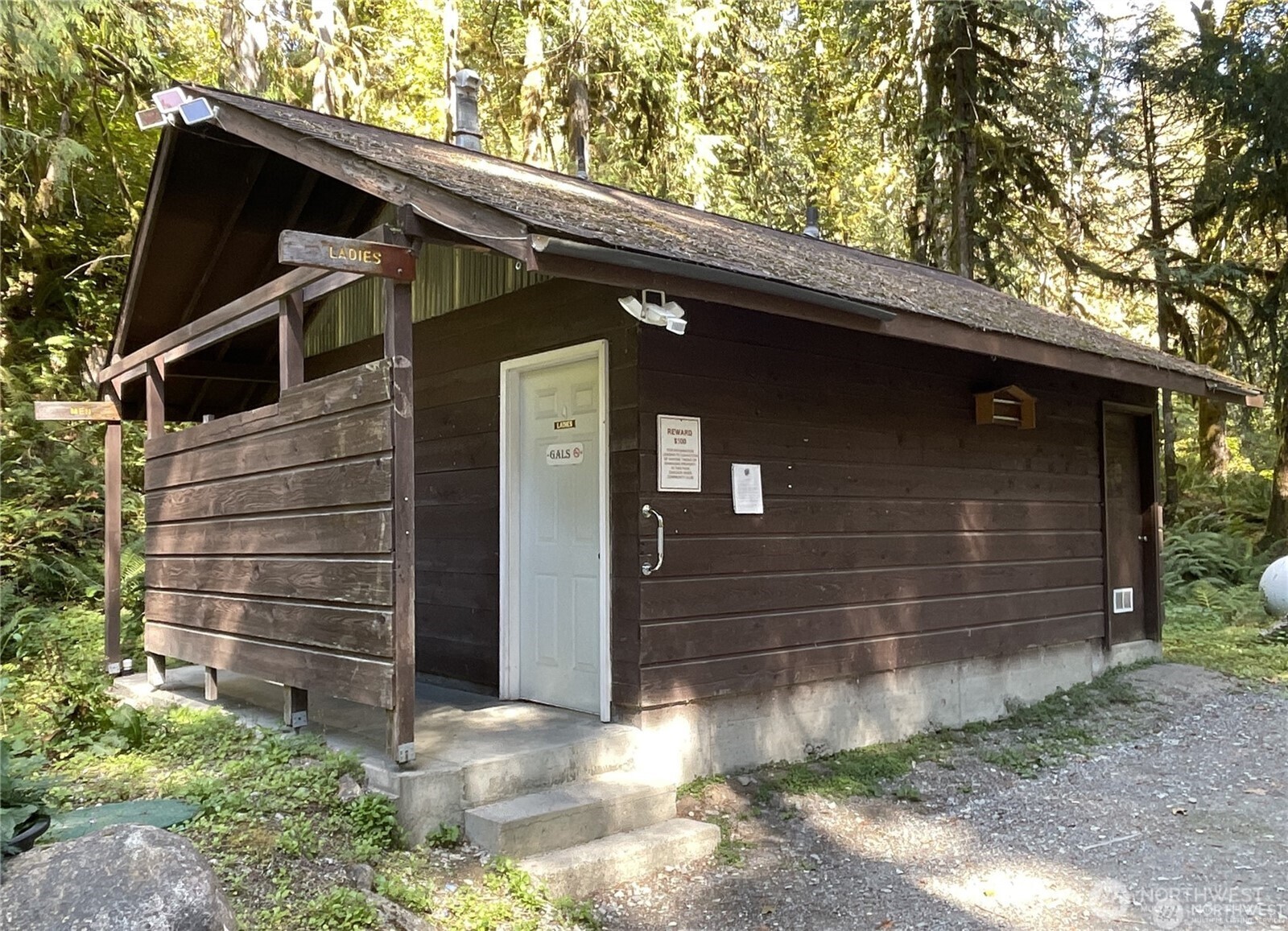 64084 Cascade River Road, Unit D1204 Marblemount, WA 98267 - Photo 23 of 26 a front view of a house with a yard