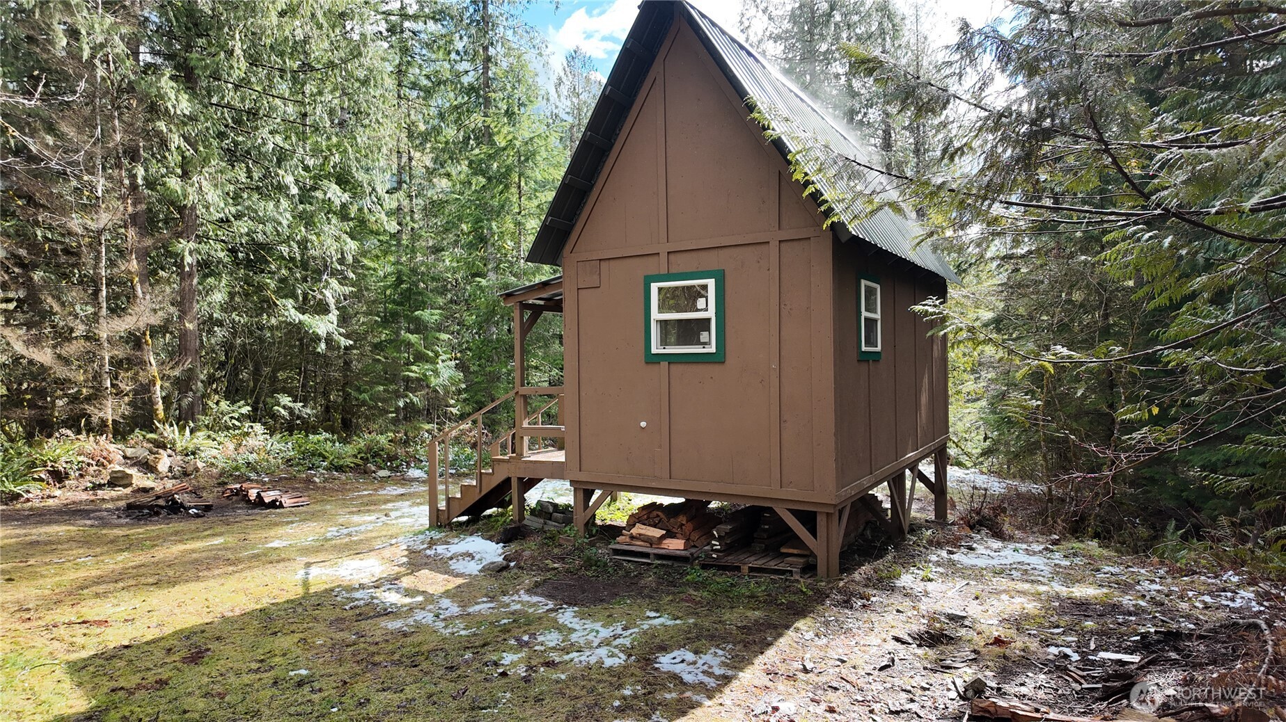 64084 Cascade River Road, Unit D1204 Marblemount, WA 98267 - Photo 6 of 26 a view of back yard of the house