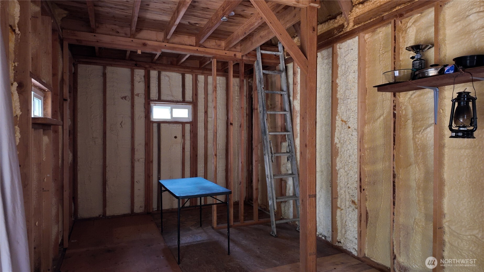 64084 Cascade River Road, Unit D1204 Marblemount, WA 98267 - Photo 7 of 26 a view of a door and a refrigerator in a room
