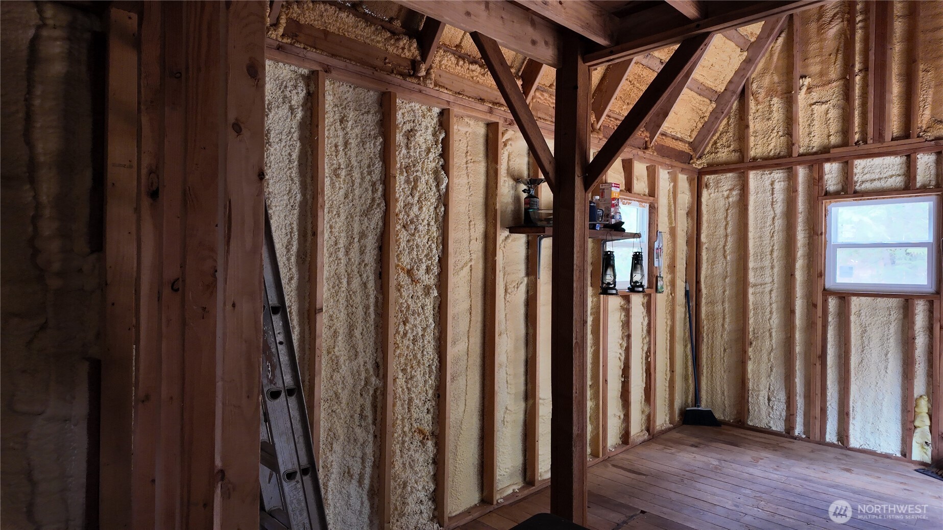 64084 Cascade River Road, Unit D1204 Marblemount, WA 98267 - Photo 10 of 26 a view of a porch with wooden floor and stairs