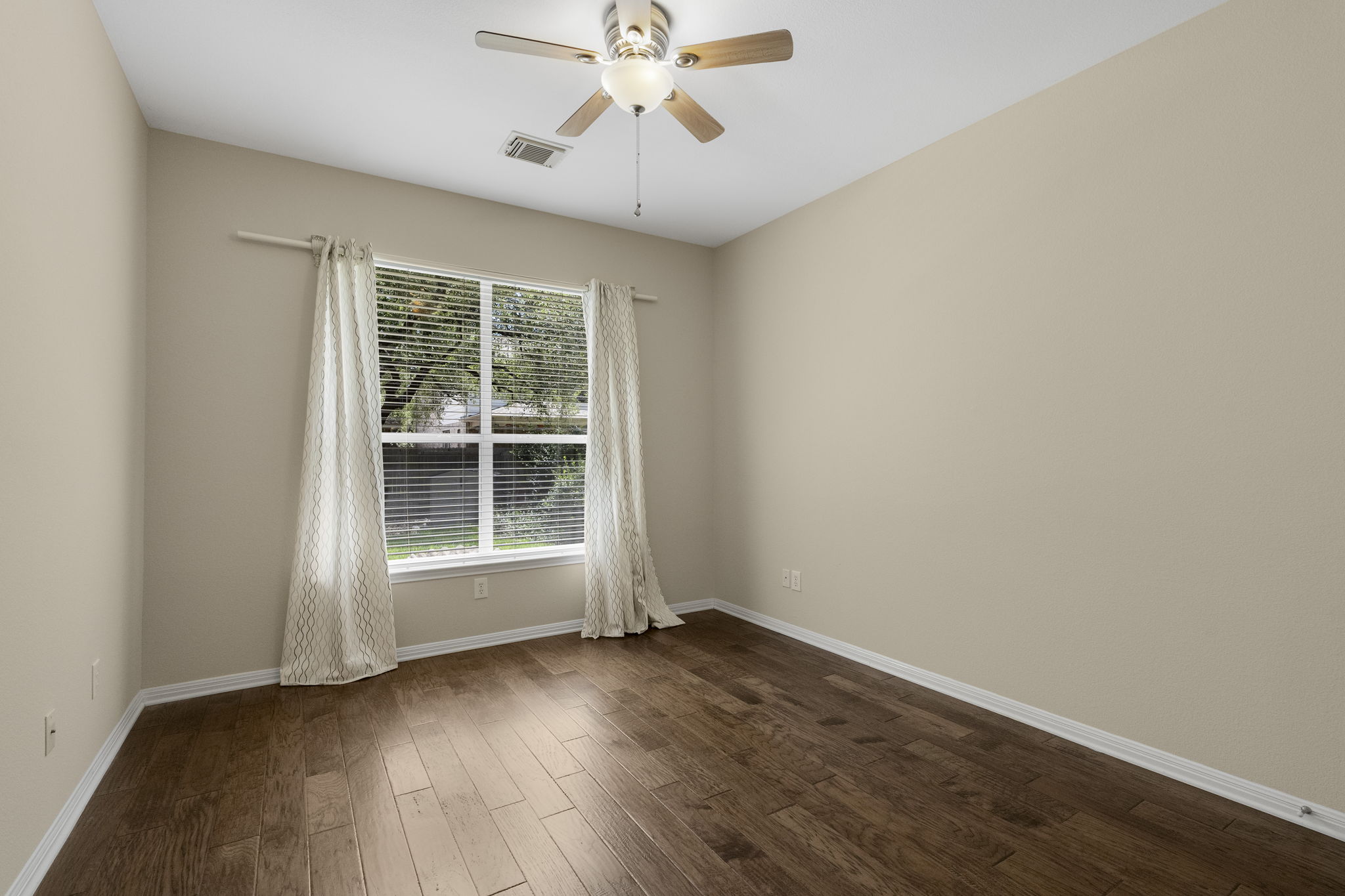 1822 Nelson Ranch Loop Cedar Park, TX 78613 - Photo 20 of 40 A main-level bedroom provides flexible accommodations for guests or multigenerational living.