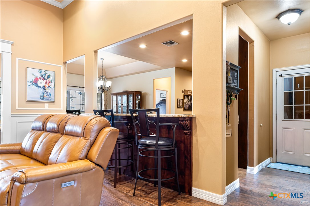 790 Spanish Grant Road Goliad, TX 77963 - Photo 6 of 41 a living room with furniture and a window