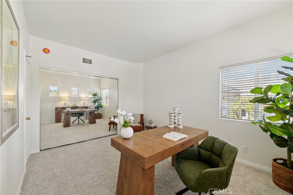 12440 Butler Way Tustin, CA 92782 - Photo 24 of 65 Another view of the upper level bedroom set up as an office facing the mirrored closet.