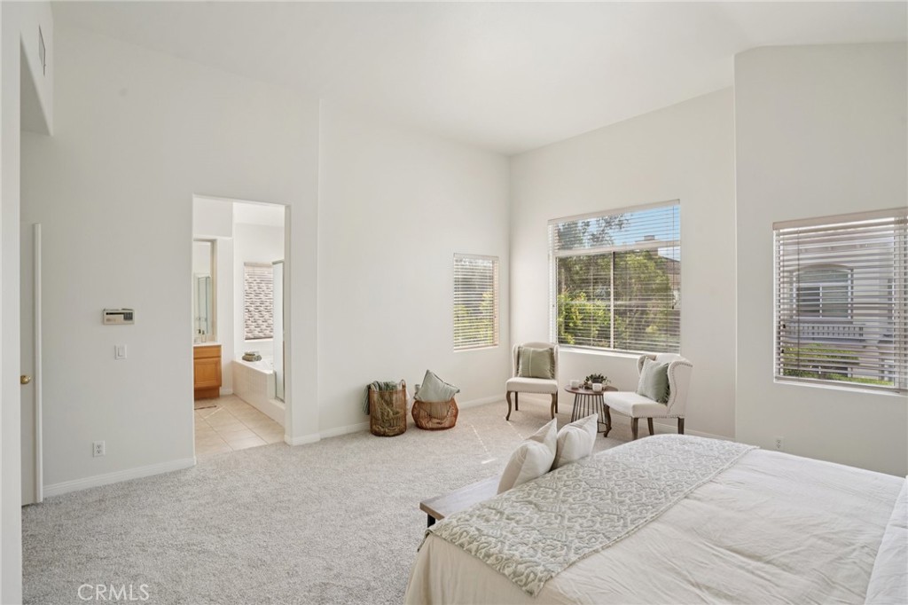 12440 Butler Way Tustin, CA 92782 - Photo 27 of 65 Another view of the primary bedroom looking towards the luxe ensuite bath.
