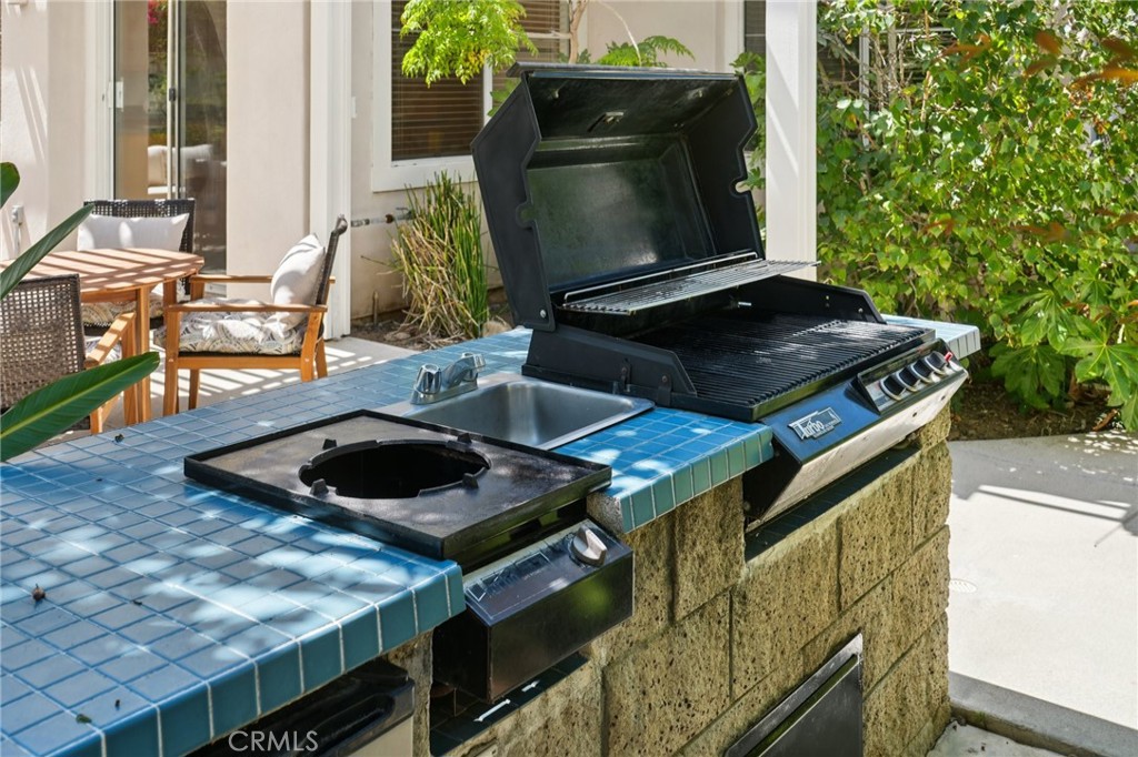12440 Butler Way Tustin, CA 92782 - Photo 39 of 65 Another view of the gourmet barbeque set up in the back yard.