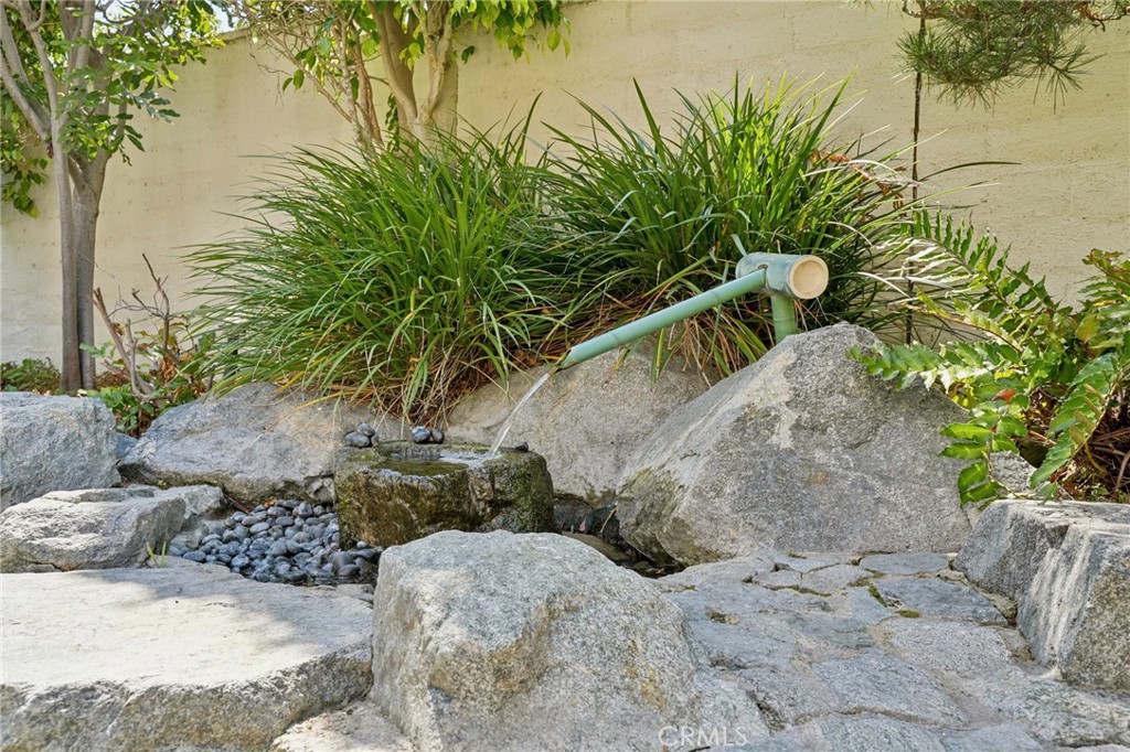 12440 Butler Way Tustin, CA 92782 - Photo 45 of 65 Water feature in back yard is very soothing.