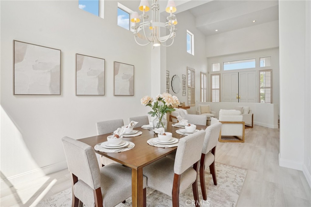 12440 Butler Way Tustin, CA 92782 - Photo 10 of 65 View looking at the front foyer from the dining room.
