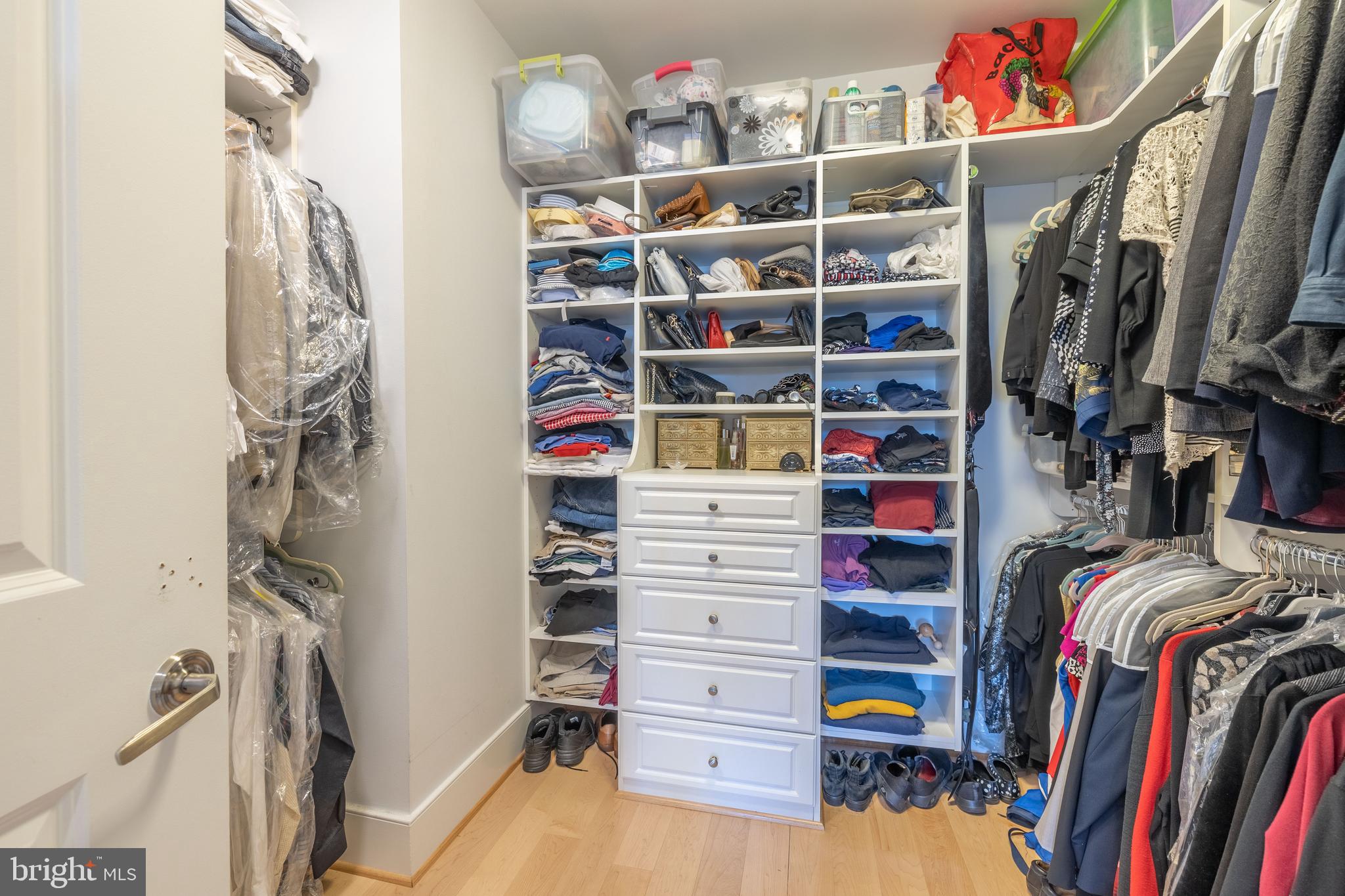 4301 Military Road Northwest, Unit 603 Washington, DC 20015 - Photo 19 of 35 Large Walk-In Closet w/ Custom Shelving