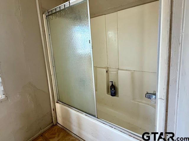 17159 County Road 1182 Flint, TX 75762 - Photo 19 of 29 a bathroom with a glass shower door