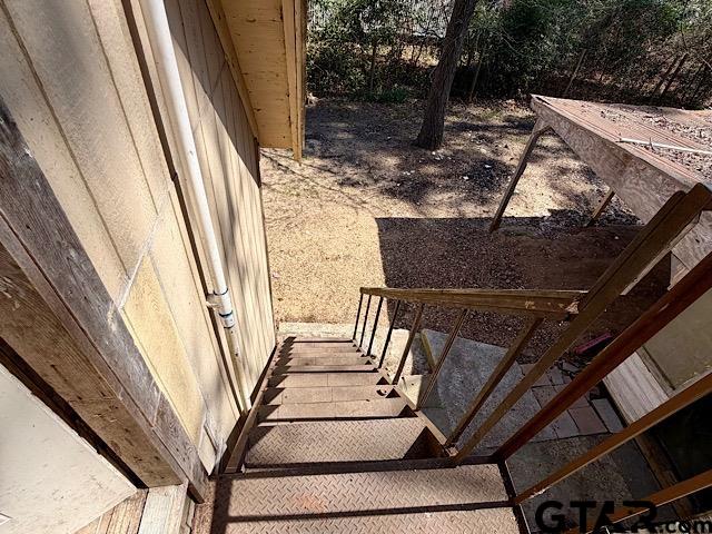17159 County Road 1182 Flint, TX 75762 - Photo 23 of 29 a view of balcony with wooden floor and fence