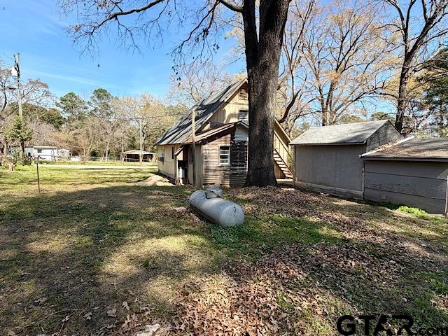 17159 County Road 1182 Flint, TX 75762 - Photo 29 of 29 a backyard of a house with lots of green space
