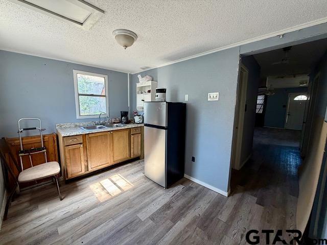 17159 County Road 1182 Flint, TX 75762 - Photo 6 of 29 a kitchen with a refrigerator and a sink