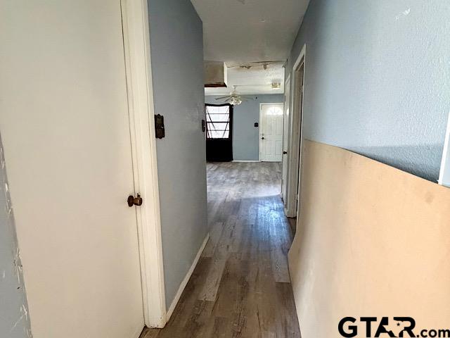 17159 County Road 1182 Flint, TX 75762 - Photo 7 of 29 a view of a hallway with wooden floor and staircase