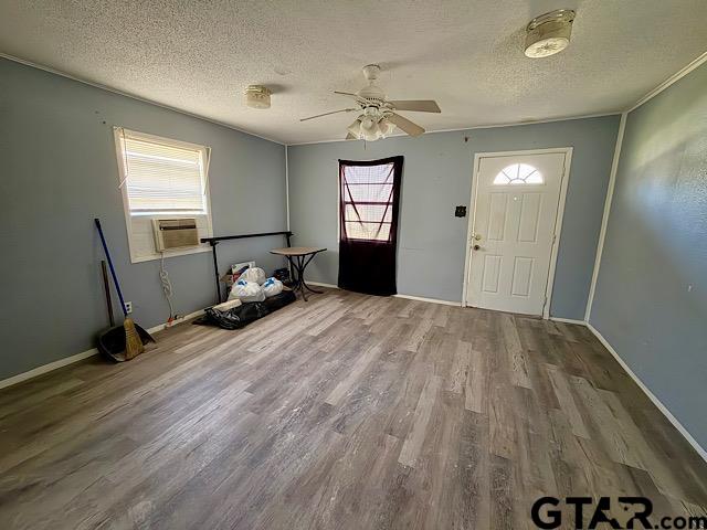 17159 County Road 1182 Flint, TX 75762 - Photo 10 of 29 a bedroom with a bed and wooden floor