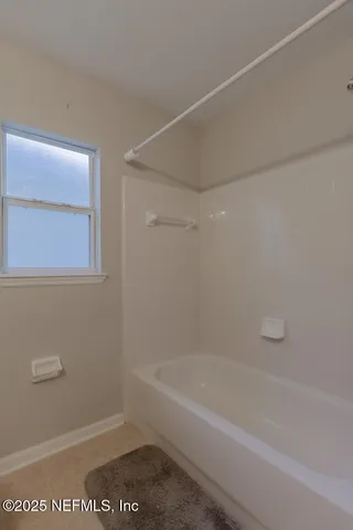 a bathroom with a bathtub