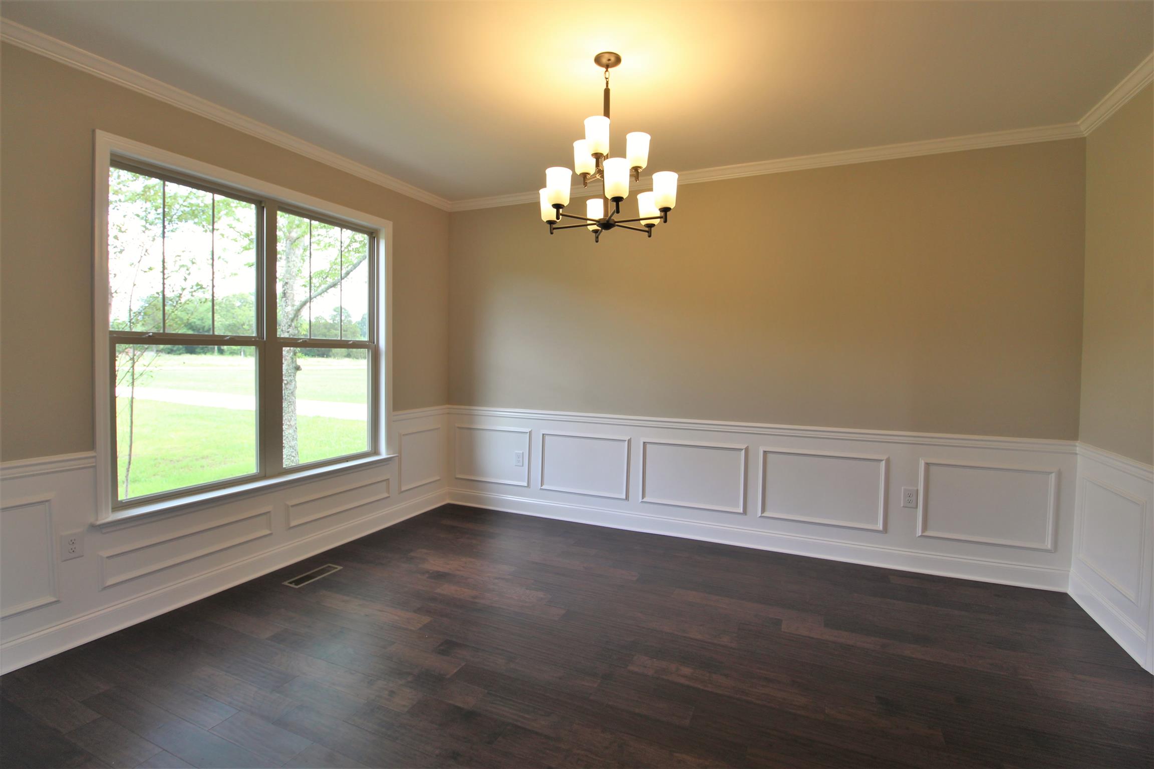 7150 Cedar Forest Road Lebanon, TN 37090 - Photo 11 of 29 wooden floor in an empty room with a window
